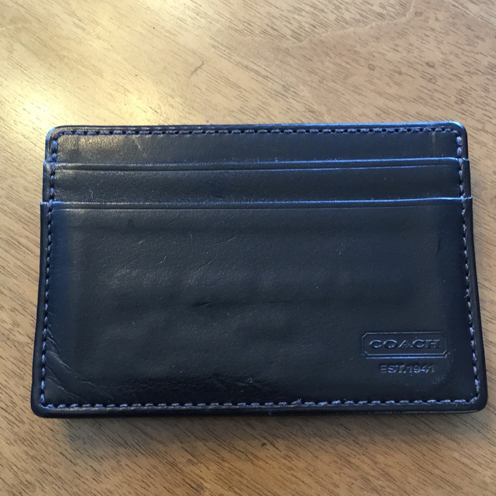 Coach men’s money clip wallet.